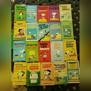 Vintage Snoopy Peanuts paperback books lot of 21